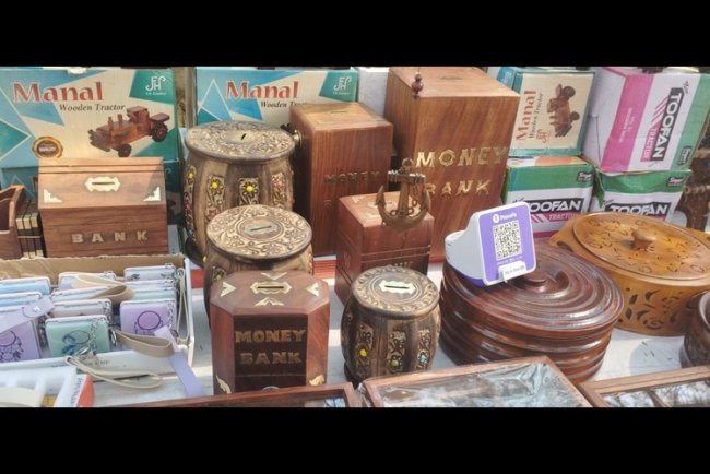 Wooden Piggy Banks in High Demand at Surajkund Mela