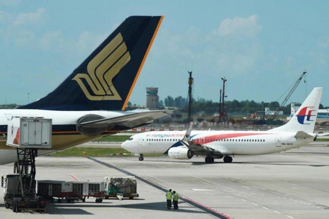Singapore Plans Carbon Offset Law for Airlines Amid Emissions Overshoot Warnings